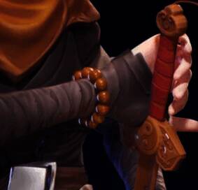 逍遥左手佩戴古铜色佛珠图片