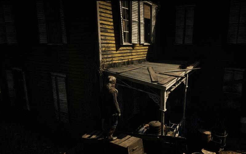 荒野大镖客2恐怖人体改造试验彩蛋房屋旁的木箱