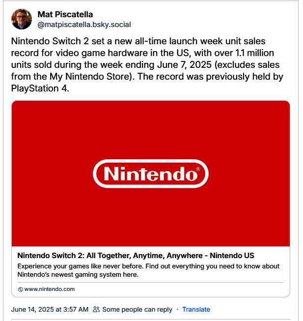 任天堂Switch 2主机与多款热门游戏光碟摆放在一起的桌面视角图