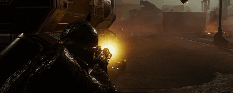 《绝地潜兵2》游戏内角色身穿中型护甲,手持主武器与手枪,周围摆放着多种战备道具