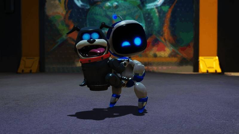 索尼高管赫尔曼·赫尔斯特在PlayStation业务发布会上发表讲话,背景为《宇宙机器人》游戏画面