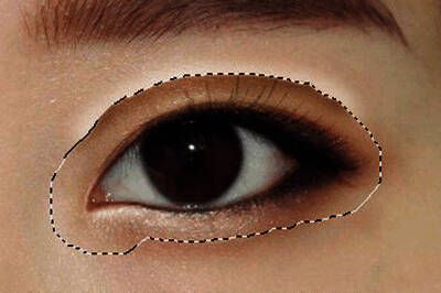 减淡工具使用效果图,展示明亮与阴影对比的双眼皮效果