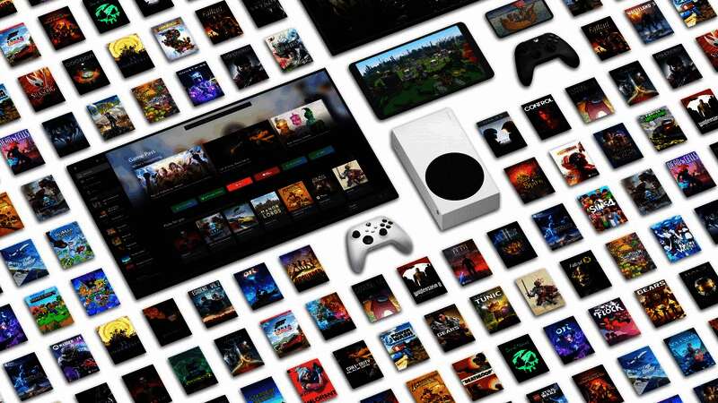 Iain MacIntyre工作照，背景为Xbox办公环境及Game Pass宣传海报