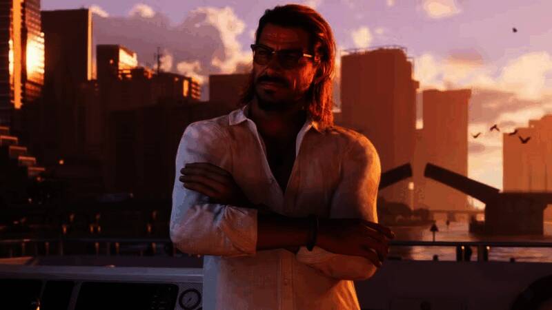 Take-Two CEO Strauss Zelnick在财报会议上发言的现场照片,背景屏幕显示GTA6艺术概念图