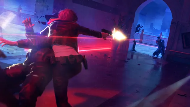 The Initiative工作室旧址外景照片:玻璃幕墙写字楼前停放着印有《完美黑暗》初代封面的复古游戏卡带造型雕塑,雕塑表面覆盖薄尘